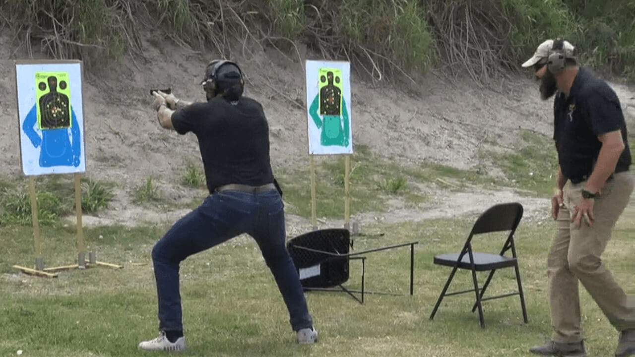 Two men at a shooting range.